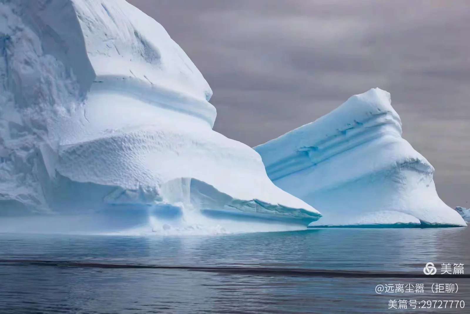 Blue icebergs on Antarctic waters.